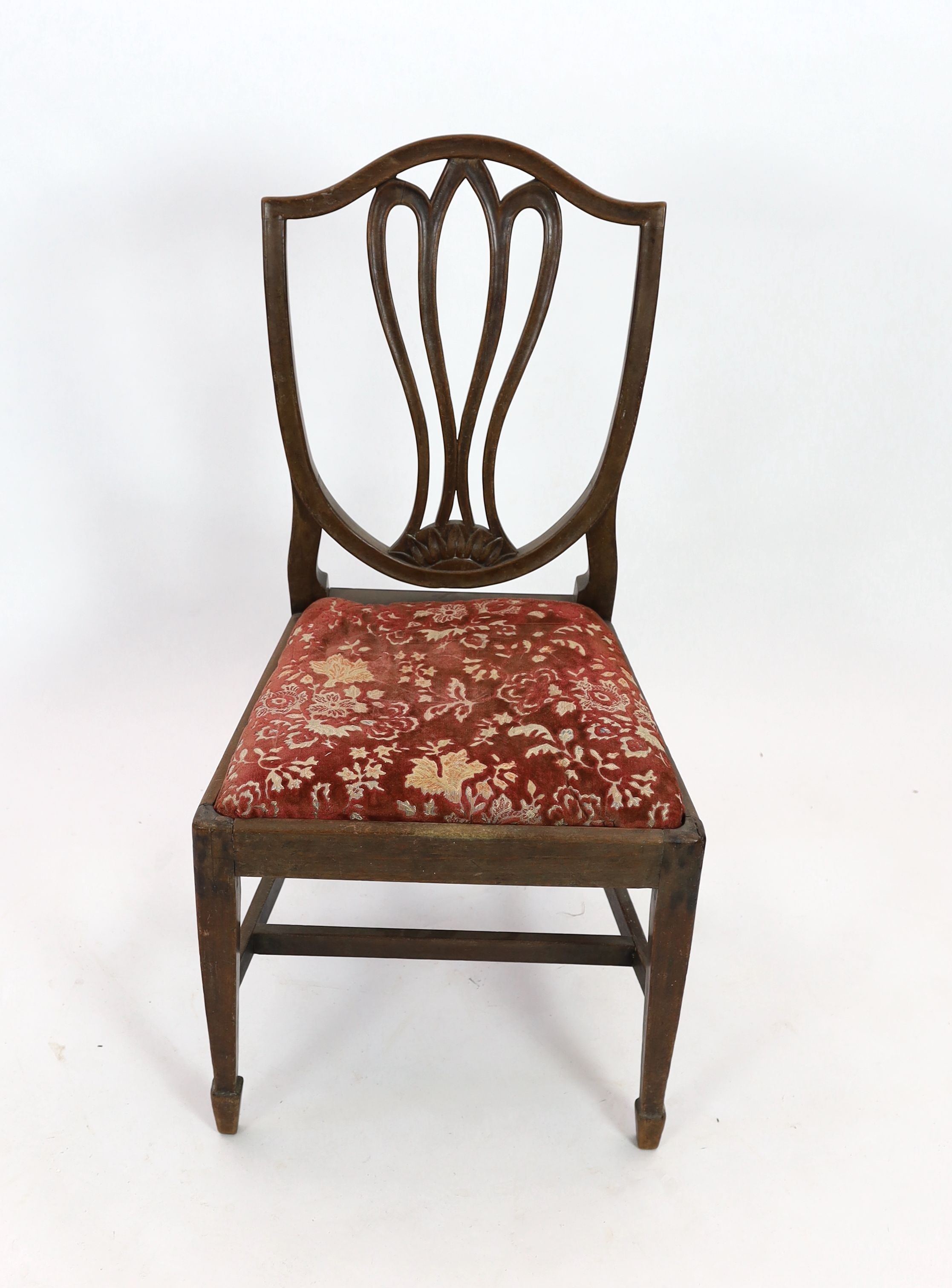 A George III Sheraton style provincial mahogany dining chair